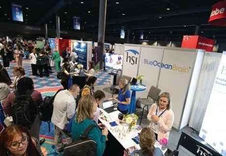 Learning about the latest training solutions in the Expo Hall. PHOTOGRAPHY BY HUGHES FIORETTI PHOTOGRAPHY