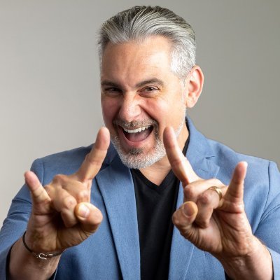 cavalier-josh Photo of Josh Cavalier holding up both hands