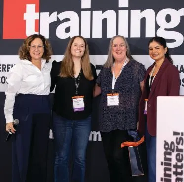 Kathleen Farrell (TJX Cos. Inc.) won an iPad from Panopto. PHOTOGRAPHY BY @NOLAEVENTPHOTOGRAPHY