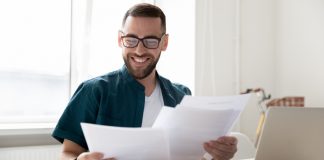 man reading an application