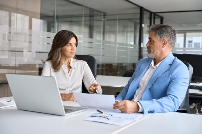 Finance,Manager,Lawyer,And,Investor,Discussing,Corporate,Project,At,Meeting.