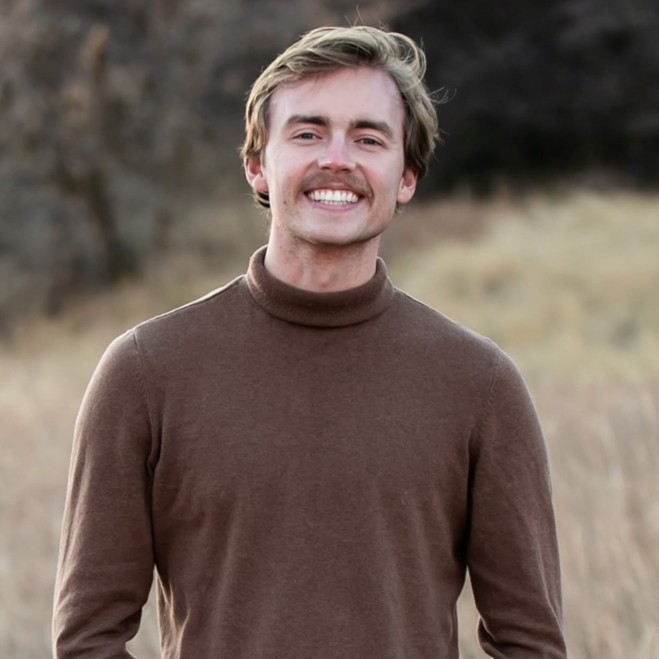 webb-ethan Photo of Ethan Webb with moustache and wearing brown turtleneck